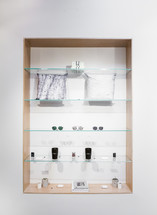 items on glass shelves 