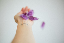 love tattoo and purple petals 