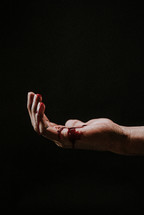 bleeding hand of Christ 