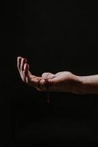 bleeding hand of Christ
