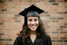 a smiling female graduate 