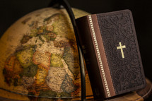 Bible and globe