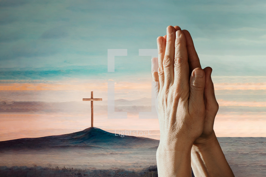 Hands praying with cross in the background