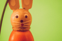 a wooden rabbit figurine 