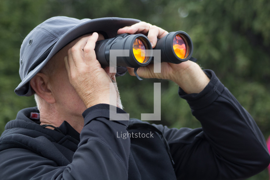 man with binoculars 