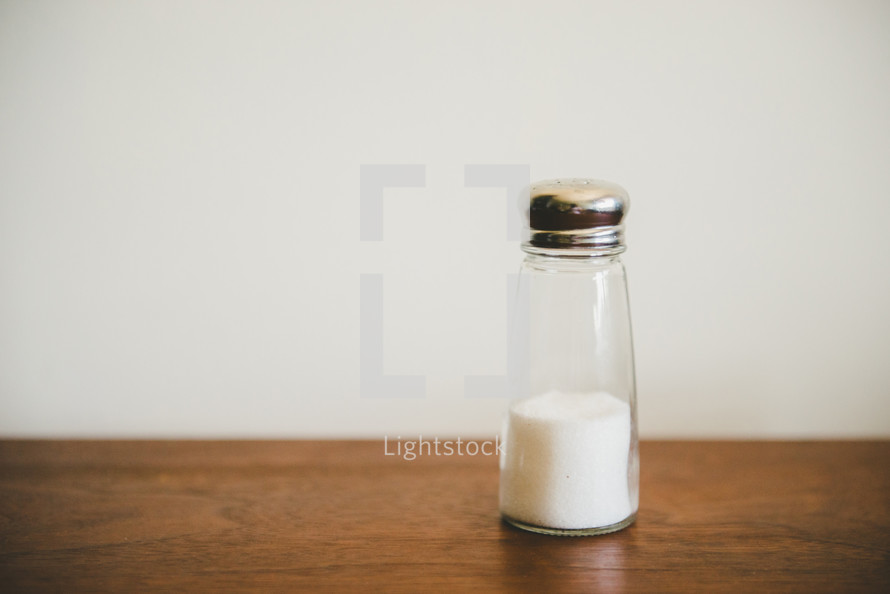 table salt in a salt shaker 