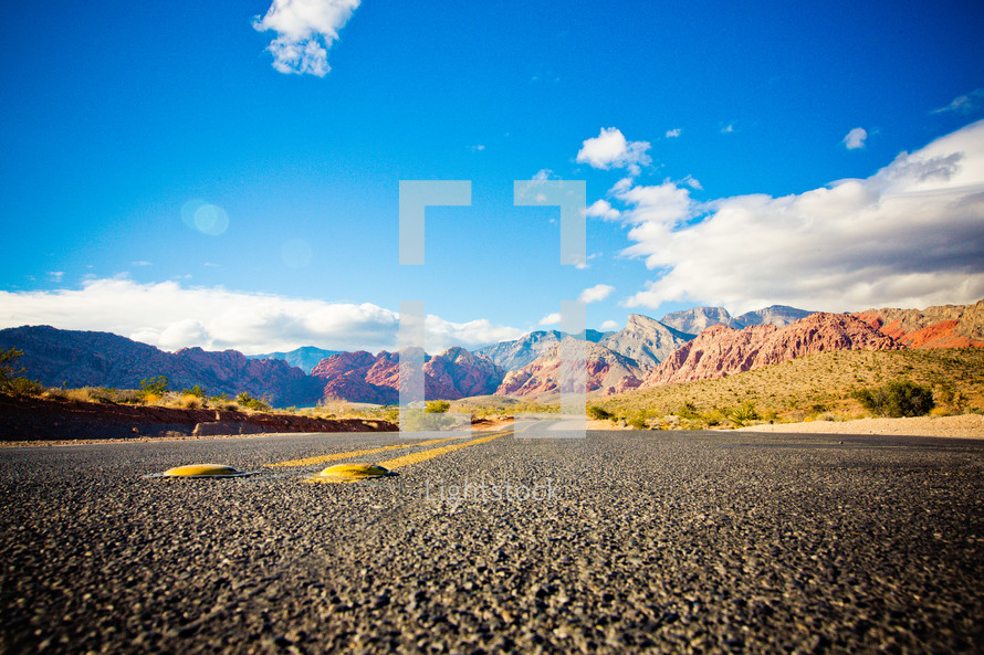 the open road through the Nevada desert mountains