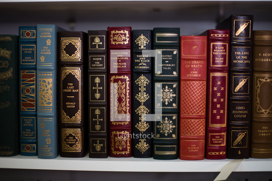 Vintage books on a shelf.