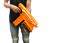 teen with nerf guns 