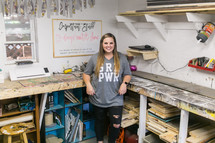 A young woman in a craft room 