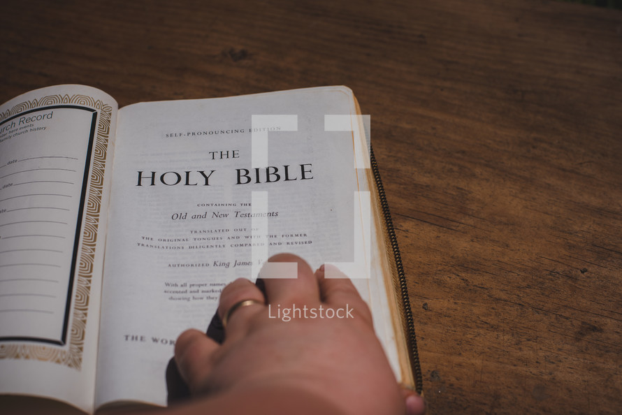 opening a Bible 