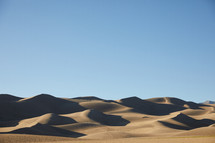 sand dunes and blue sky 
