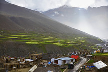 village at the foot of a mountain 
