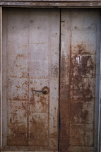 handle on an old rusty door 