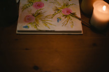 A painting of flowers on canvas. 