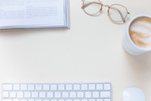 coffee cup, reading glasses, computer keyboard, copy space, desk 