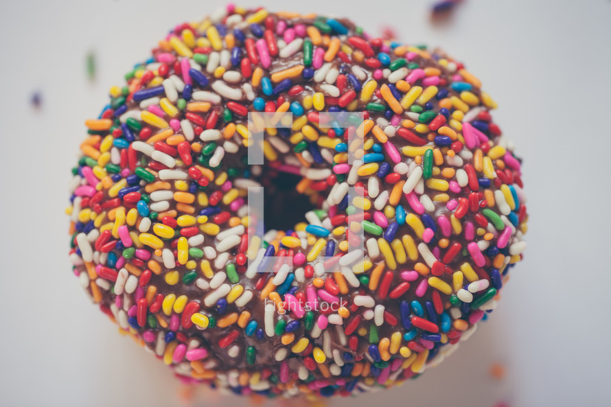 sprinkled donut on a white background 