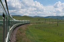 Train traveling through the countryside.
