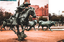 ranches and cattle statue 