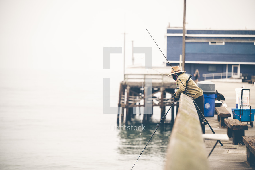 fishermen on a pier 