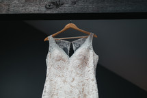 wedding dress on a hanger 