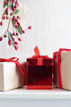 red berries, fairy lights, and gifts for Christmas 