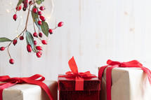 red berries, fairy lights, and gifts for Christmas 