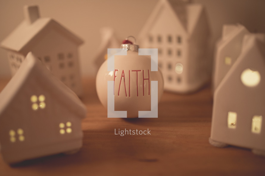 faith Christmas ornament and white houses 