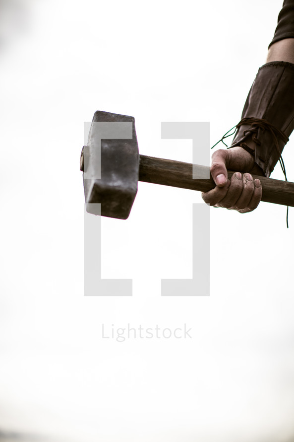 man holding a mallet