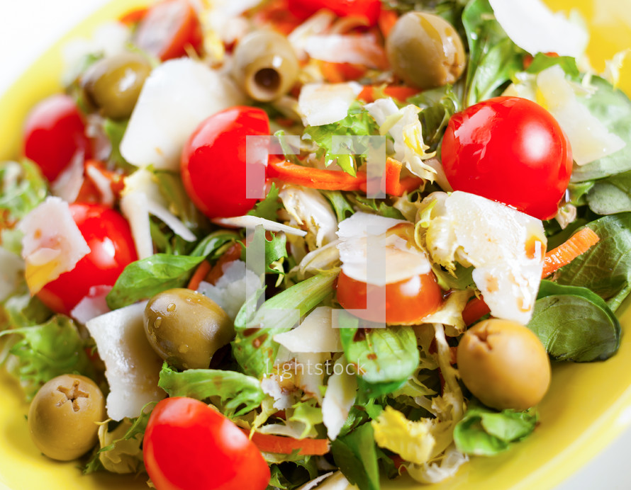 Mixed salad from above with olives, cheese and tomatoes