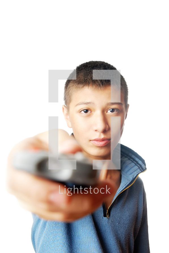 a boy holding a tv remote control 