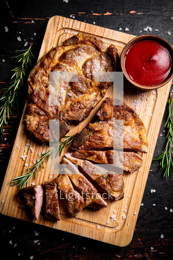 Grilled pork steak with rosemary. High quality photo