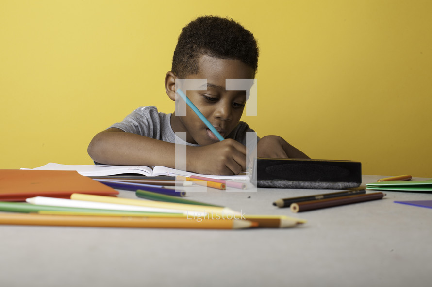 a boy child coloring 