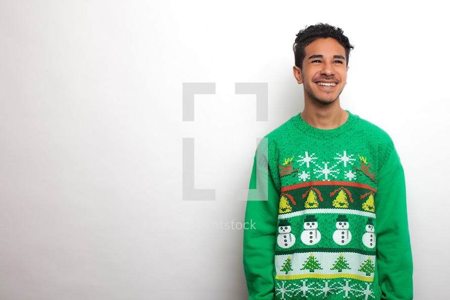 man in an ugly Christmas sweater 