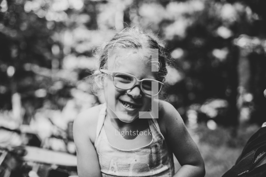 little girl in glasses 