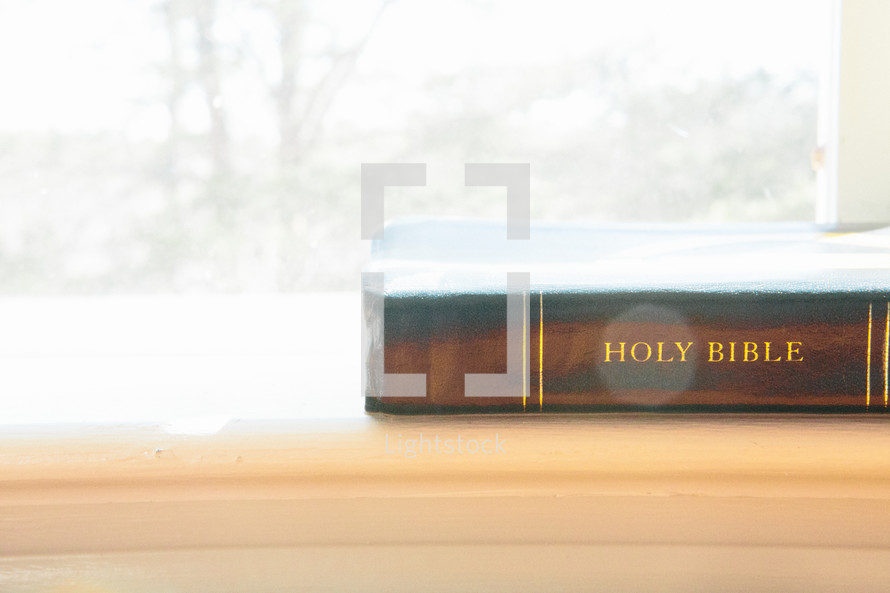 Bible on a window sill 