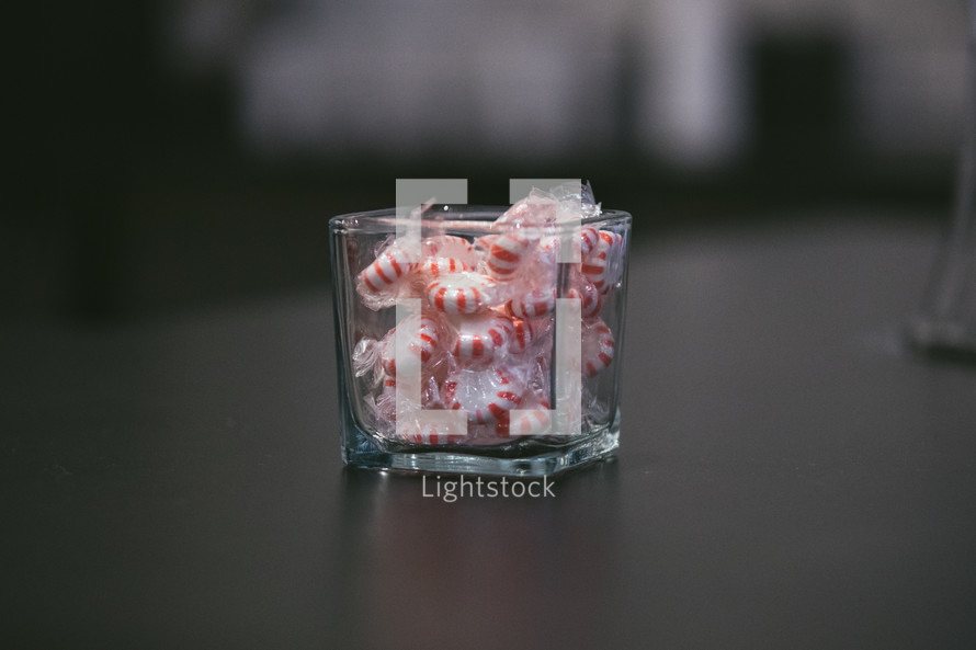 peppermint candies in a glass jar 