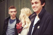 group of teens in conversation 