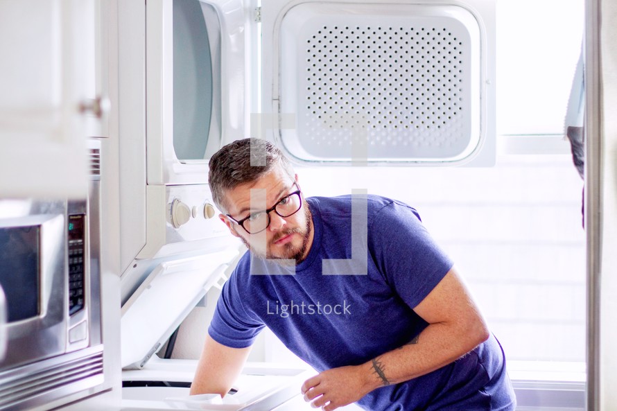 a man doing laundry 