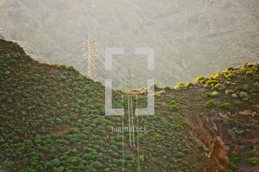 green mountains and power lines in Tenerife, Spain