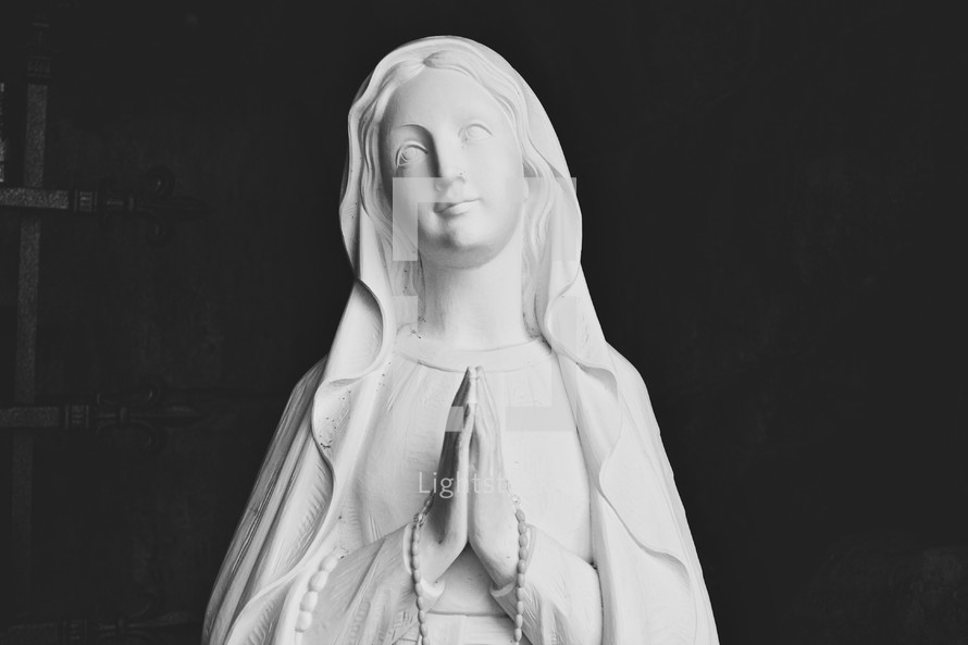head of a statue of Mary praying