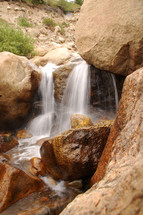 trickling water over rocks 