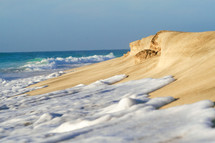 sea foam on the sand 