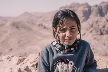 a child in a desert 