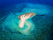 aerial view over a small island 