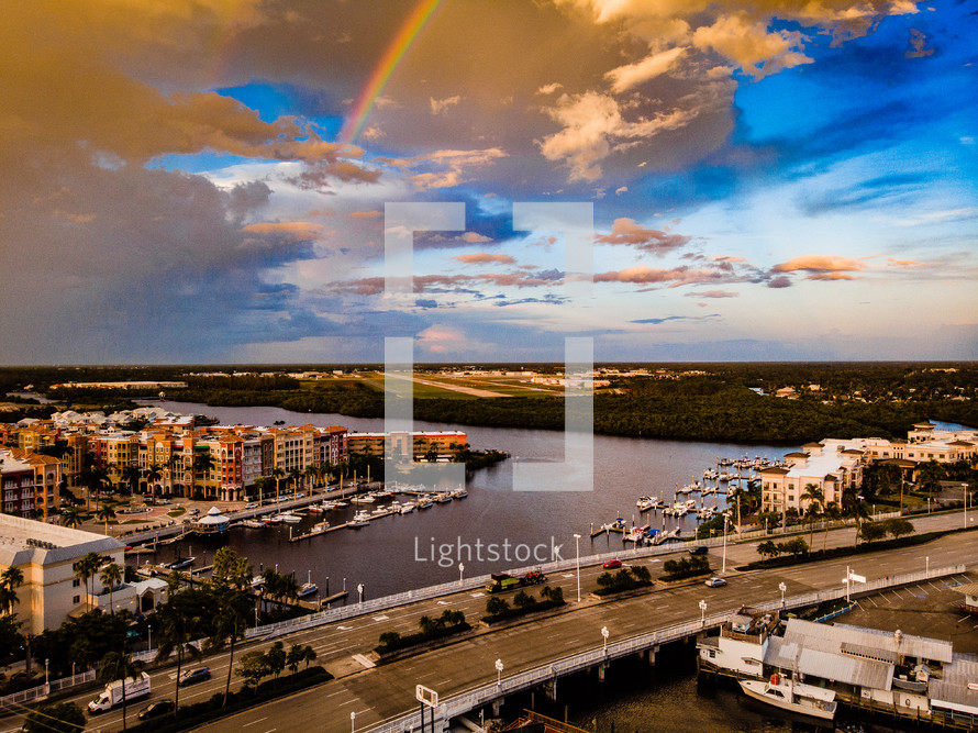 rainbow over a coastal community 