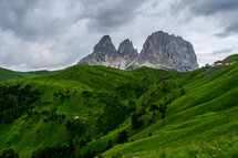 jagged mountain peaks and green landscape 