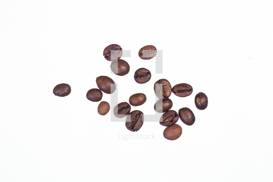 Coffee beans against a white background.