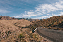 highway through desert mountains 