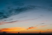 power lines in a sky at sunset 